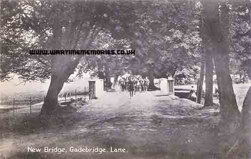 Soldiers going over a bridge in Gadebridge Park this bridge was built in 1915 especially for their use.